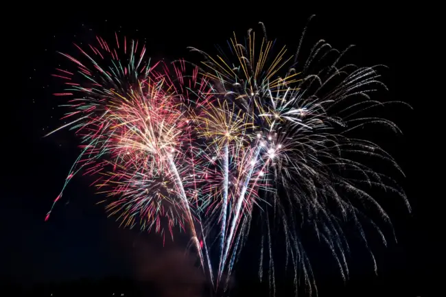 Photo by Elisha Terada fireworks at nighttime